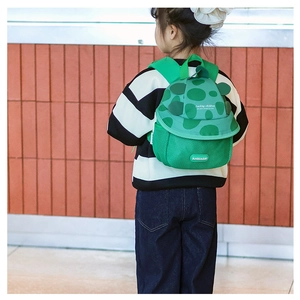 Green turtle shell cartoon backpack for kids showing adjustable straps and back fit