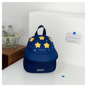 Detail of blue baseball cap shaped toddler backpack with 3D stars and mesh fabric