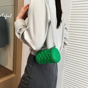 Bright green quilted cylinder shoulder bag for kids with stylish silver chain strap