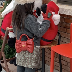 Quilted red bow shoulder bag for girls with gold chain strap and luxury metal buckle