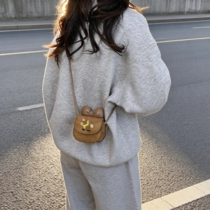 Cute brown cartoon pony crossbody bag for girls with a stylish bow and animal embroidery
