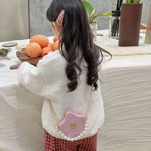 Pink glitter star-shaped kids handbag with pearl strap and golden star metallic clasp