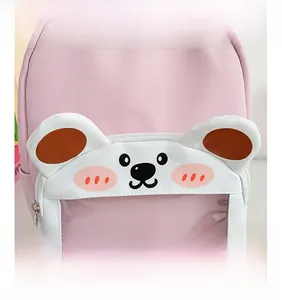 Pink canvas backpack detail with cute white bear pocket and transparent star window