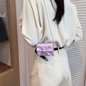 Mini lavender bow crossbody bag with gold chain and pearlescent finish for girls