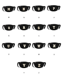 Flat lay of black children's chest bags featuring varsity letter patches from M to Z