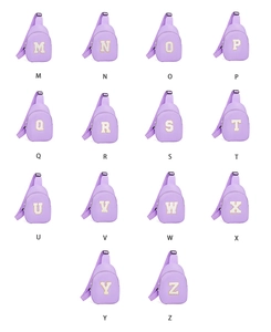 Detail display of purple nylon chest bags featuring chenille letter patches from M to Z