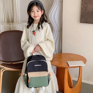 Modern color-block school backpack for kids with adjustable straps and side pockets