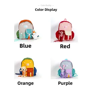 Detailed view of kids' backpacks in blue, red, orange, and purple with cute plush charms