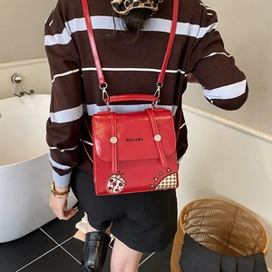Red fashion backpack for kids with ladybug print and adjustable straps