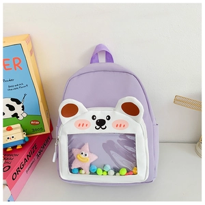 Detail of light purple toddler backpack with cartoon bear and transparent window pocket