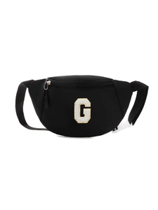 Close-up of black nylon kids chest bag featuring a gold-edged letter G towel embroidery