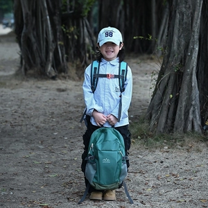 Forest green children outdoor sports backpack with mountain logo for hiking and travel