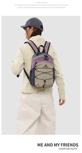 Outdoor backpack detail showing ergonomic padded straps and multi-color nylon design