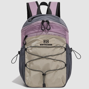 Detailed shot of durable checkered nylon fabric and elastic cord on outdoor backpack