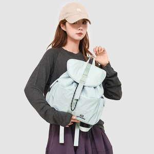 Back view of mint green lightweight nylon kids backpack with adjustable shoulder straps