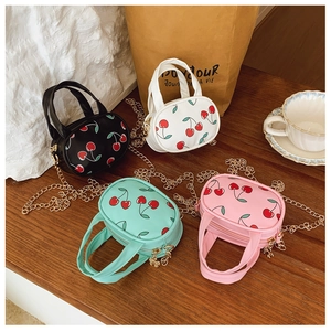 Mini cherry print crossbody bags for kids in black, white, green and pink set