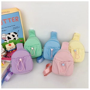 Collection of candy-colored children's crossbody chest bags in five pastel nylon shades
