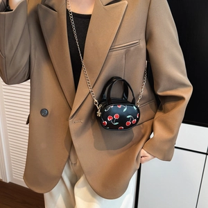 Mini black crossbody bag with red cherry prints and golden chain strap for kids