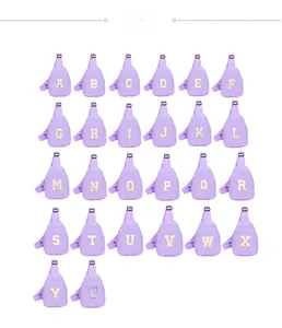 Collection of purple nylon crossbody bags with glitter gold A-Z alphabet letters