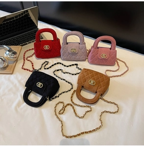 Detailed flat lay of quilted suede mini crossbody bags in five colors with chain straps