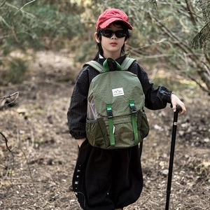 Outdoor kids hiking backpack with green plaid pattern and double strap closure