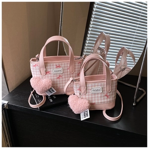 Pink checkered bucket bag set with red bow embroidery and plush heart pendant accessory
