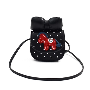 Cute black polka dot crossbody bag with a red horse embroidery and large bow detail
