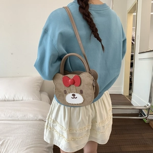 Cute cartoon bear crossbody bag for kids with red bow detail and stylish chain strap