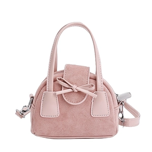 Elegant pink crossbody bag with a decorative bow and detachable shoulder strap