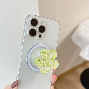 Light green floral resin phone grip with sequins and glitter for MagSafe on iPhone