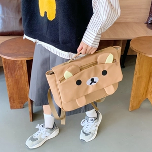 Cute brown cartoon bear shaped backpack for children with adjustable shoulder strap