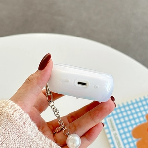 Detail view of translucent matte AirPods Pro case with pearl chain and precise cutouts
