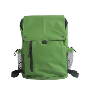 Bright green large capacity school backpack for kids with black straps and side mesh pockets