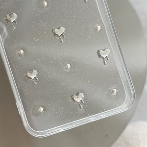 Close-up of glitter phone case with silver 3D hearts for Samsung Galaxy S25 Ultra