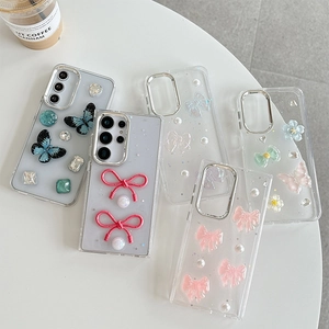 Glitter clear phone case for Samsung S25 with floral pearls and 3D butterfly decor