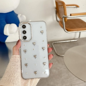 Macro detail of glitter phone case with silver hearts and pearls for Samsung Galaxy