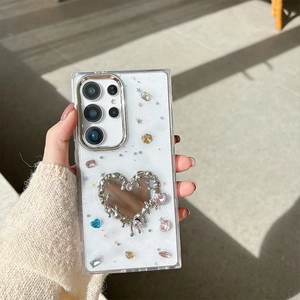Y2K sparkling phone case for Samsung S25 Ultra with metallic heart mirror and gemstones