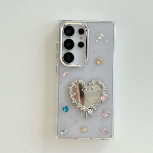 Detail of Galaxy S23 Ultra case featuring liquid metal heart mirror and colored rhinestones