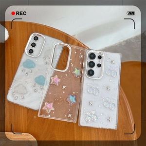 Sparkly transparent phone case with rhinestone clouds, stars and cherry for Samsung S25