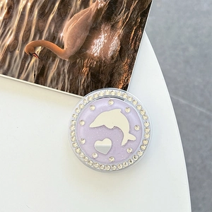 Detailed top view of purple glitter phone grip with dolphin heart and crystal rhinestones