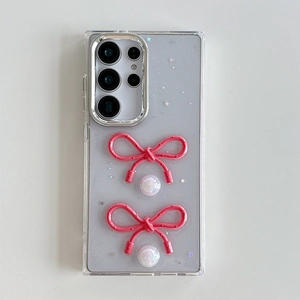 Detail of Galaxy S24 Ultra case with 3D pink bows, pearls and glitter finish