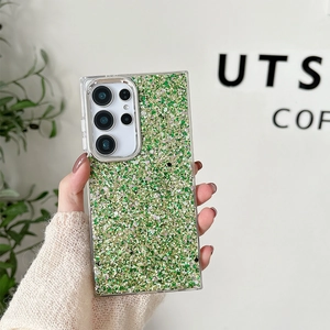 Detail of Samsung Galaxy Ultra case with sparkling green and gold glitter texture