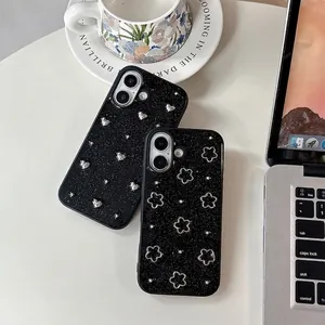 Sparkly black iPhone case featuring silver 3D heart and flower designs with glitter finish