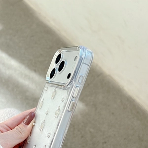 Detailed side view of clear iPhone case with silver crown ornaments and electroplated edge