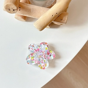 Detailed top view of 3D floral phone socket with glitter sequins and resin petals