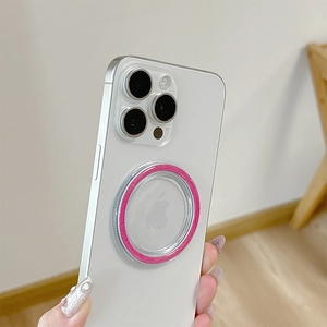 Pink glittery MagSafe magnetic phone ring holder shown in a hand-held lifestyle shot