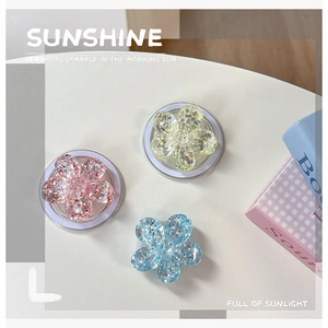 Supporto magnetico per cellulare a forma di fiore con paillettes colorate brillanti