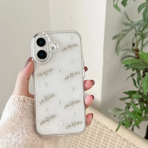 Stylish transparent iPhone case with silver star charms and small pearls held in hand