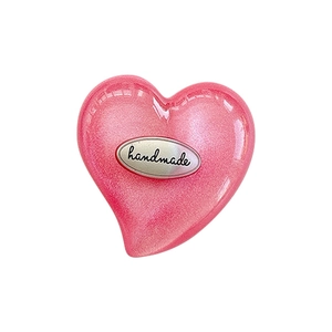 Pink heart-shaped phone grip with glitter finish and handmade silver metal plaque