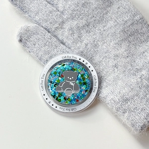 Macro detail of magnetic phone grip with glitter, bear motif and Gift For You text
